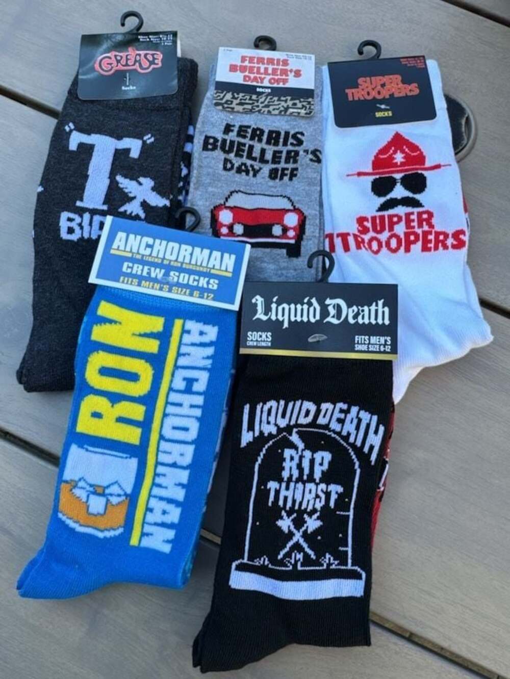 Novelty Movie and Brand Crew Socks Lot of 5 Pairs - Liquid Death, Anchorman, Fer